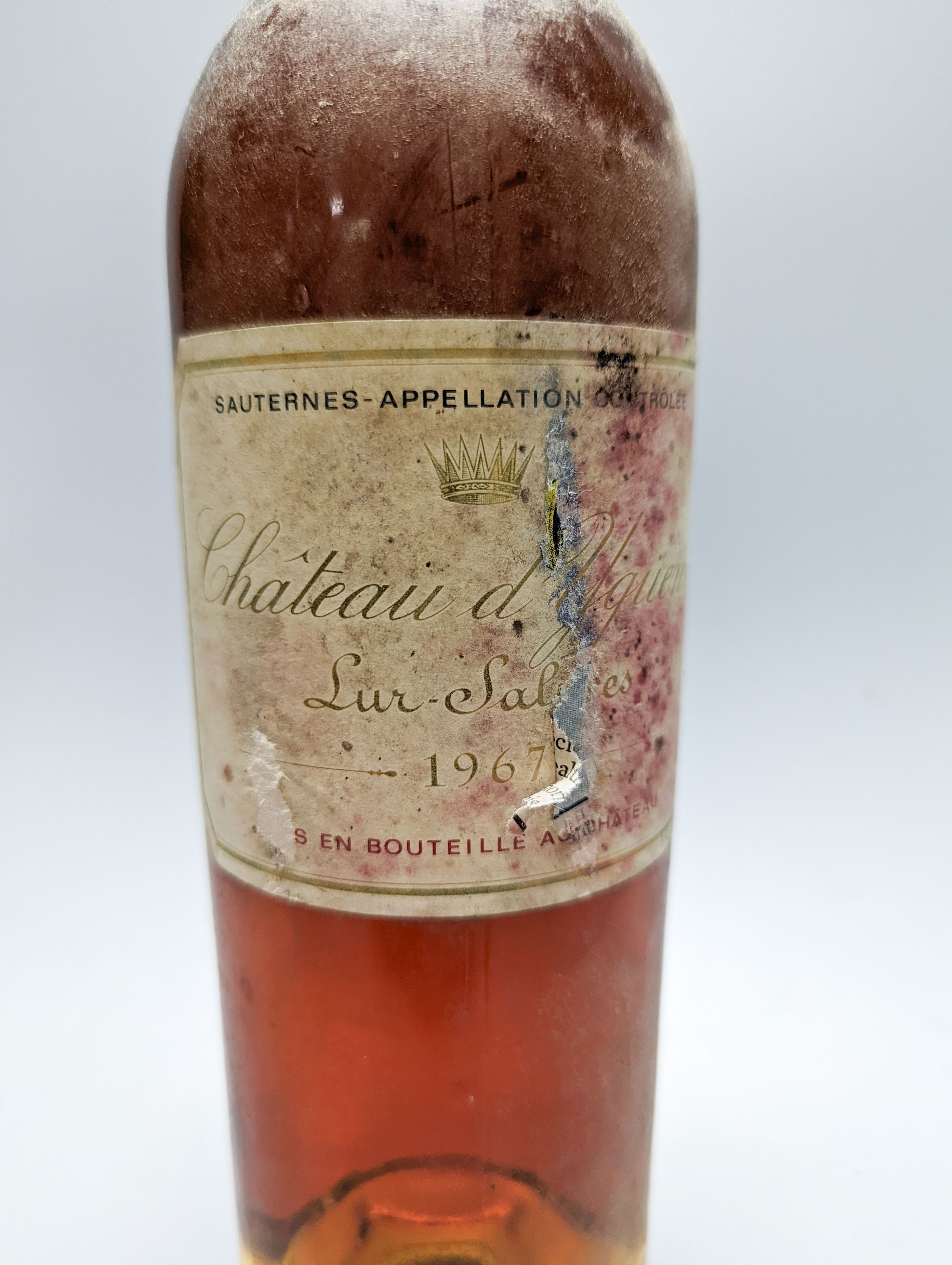 Two bottles of Chateau D'Yquem Sauternes 1967-1965, and a 375ml bottle